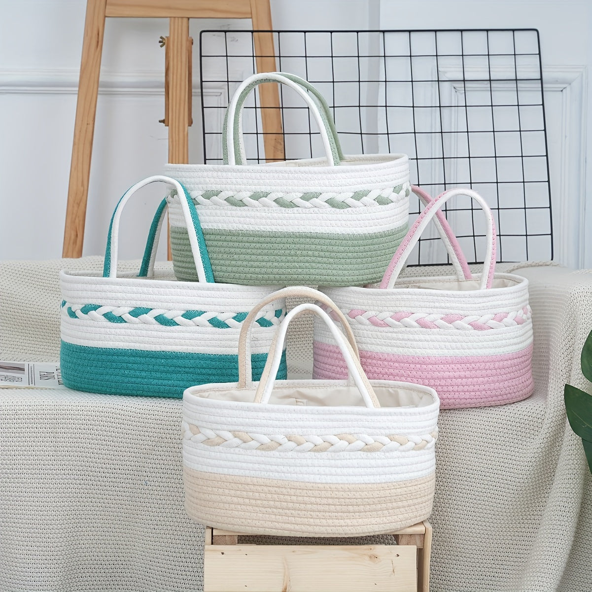 A Large Capacity Foldable Storage Bag Made of Bohemian Rope, Featuring a Woven Handle And a Removable Lining. It Comes in a Striped Design of Cyan, White, Pink, And Beige, Shelf Baskets