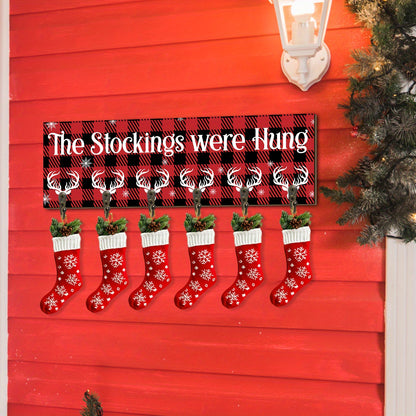 A Single Christmas Stocking Holder Featuring Six Hooks, Designed to Hang Stockings on a Wooden Sign. This Decorative Wall Hook Rack Is Perfect for Mantels, Showcasing The Phrase 'The Stockings Were Hung' in a Snowflake Design