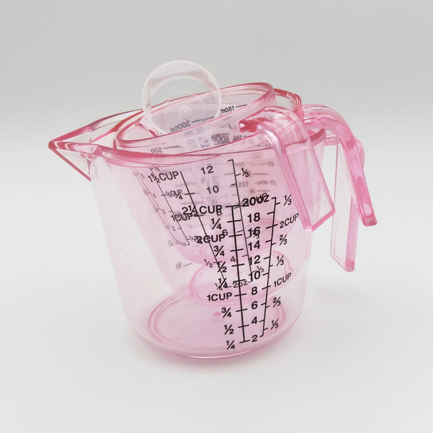This Set Includes Four Pink Measuring Cups: 6 Oz, 12 Oz, And 20 Oz, Along with a 20 Ml Transparent Spoon. Made from -Safe PS Material, It Features Measurements in Ml, Oz, And Cups
