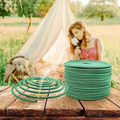 A Box Containing 48 Citronella Essential Oil Incense Coils, Complete with a Complimentary Incense Holder, Ideal for Outdoor Activities Such As by The Pool, on The Patio, Porch, Deck, Or During Camping And Hiking, Featuring Lemongrass