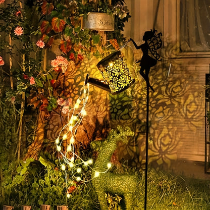 Solar Fairy Waterfall Lights for Halloween Decoration, Featuring a Solar Watering Can Lamp Made of Metal. This Garden Decor Includes 36 LED Flowing String Lights And Serves As an Outdoor Solar Stake Lamp. It Is IP65 Waterproof, Suitable for Patios